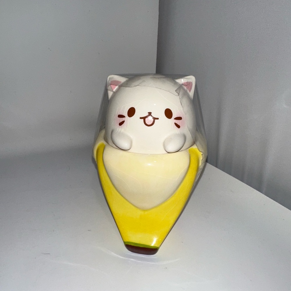 Glass banana mug with cat head cover